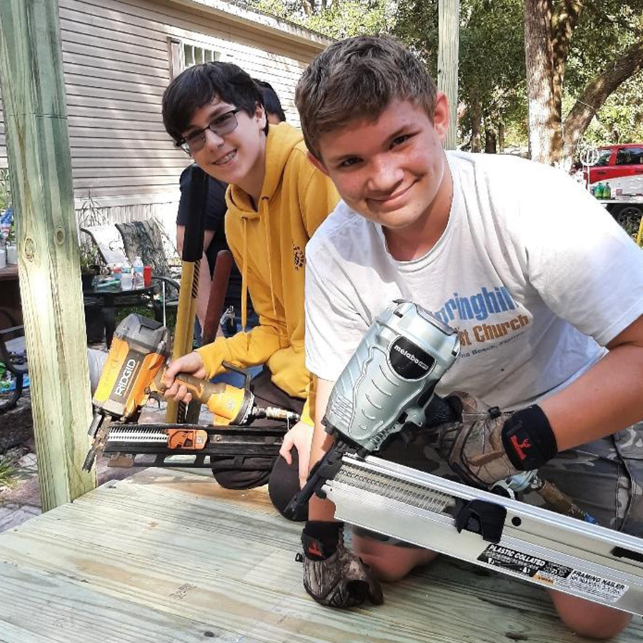 Boys working on handicapped ramp build